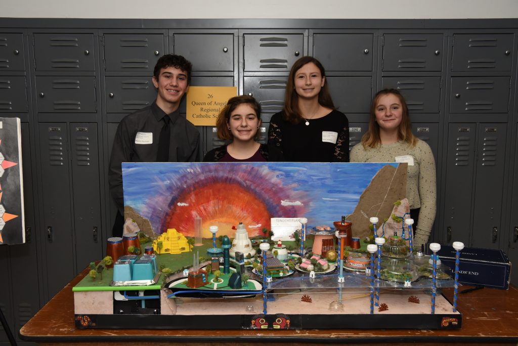 The winning team with their award